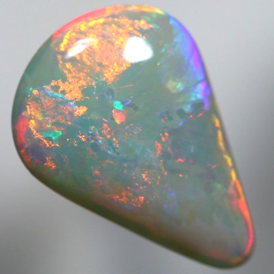 SOLID SEMI BLACK OPAL Crisp red and orange over green and blue